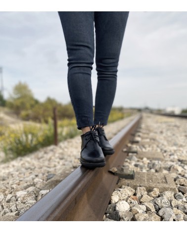 LEATHER BOOT WITH SHEARLING