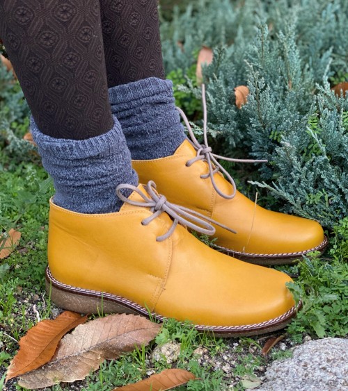 LEATHER BOOT WITH SHEARLING